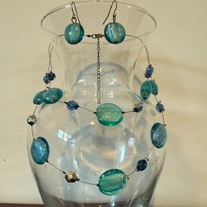 2 stranded necklace featuring turquoise blue glass beads, matching earrings